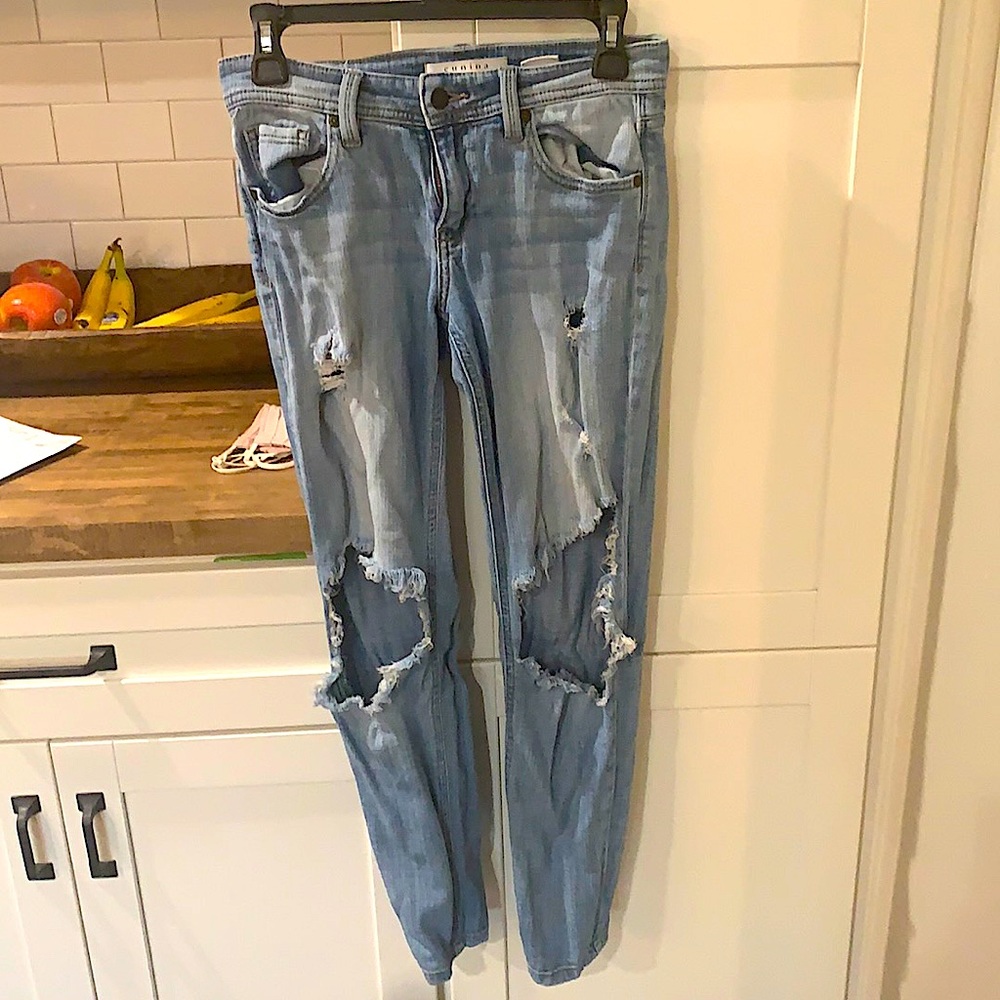 Faded wash ripped jeans